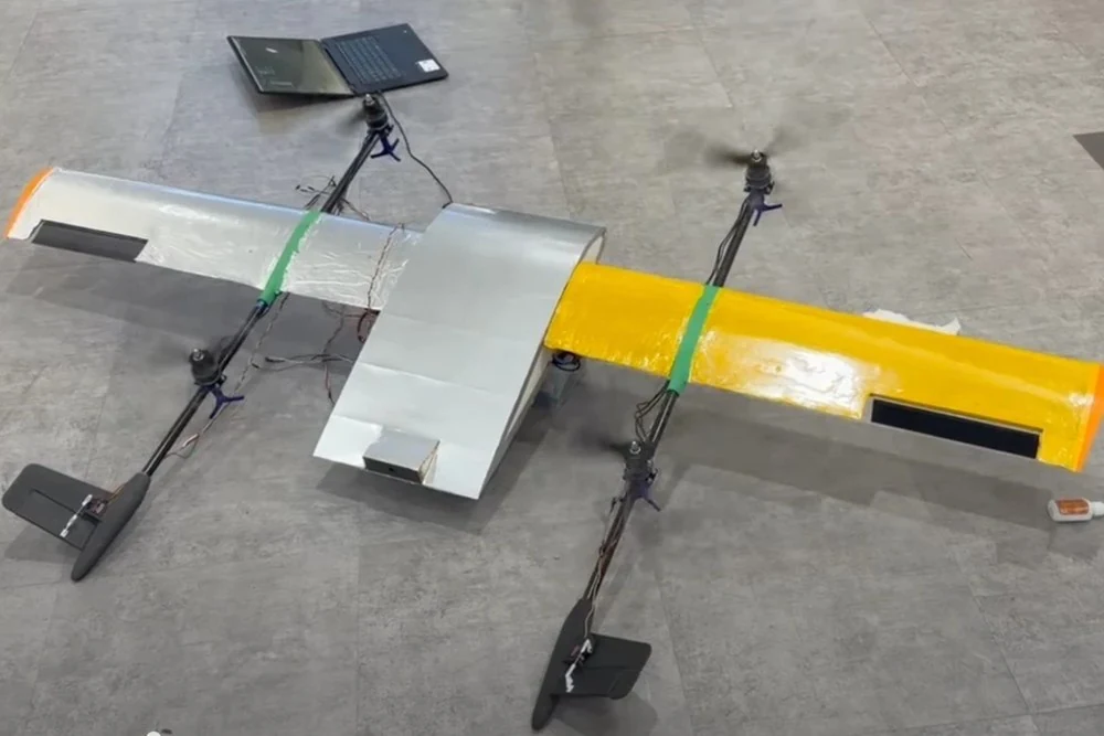 Stanford student-built fixed-wing VTOL prototype in ground testing. Portfolio photograph.